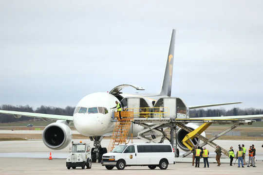 The first shipments of the COVID-19 vaccine are loaded into a UPS plane in Lansing, Michigan, on Dec. 13, 2020. The first shipments of the COVID-19 vaccine are loaded into a UPS plane in Lansing, Michigan, on Dec. 13, 2020.