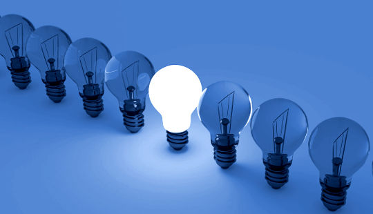 Taking Charge of Our Life from the Inside Out one lightbulb lit up in a row of unlit lightbulbs