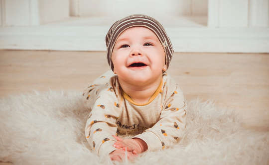 Renaming and Reclaiming the Sacred baby smiling