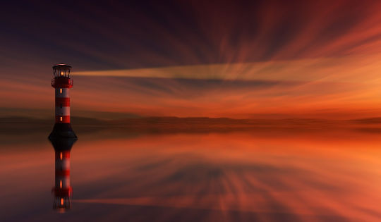 Today's Inspiration: October 28, 2022 lighthouse at sunset reflected in the water