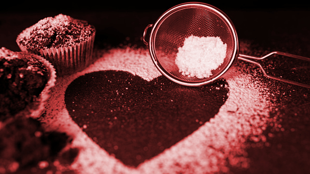 a sifter on top of the shape of a heart