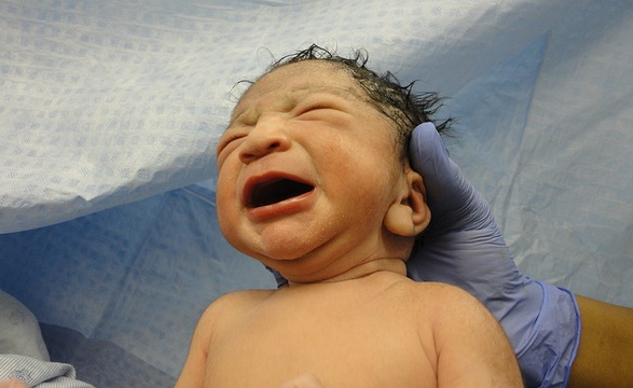 Is Our Deepest Wound Our Birth Trauma? a crying newborn child