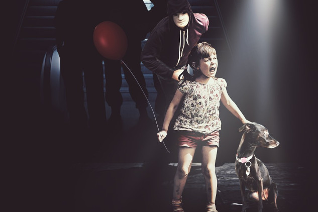 a young child frightened and crying