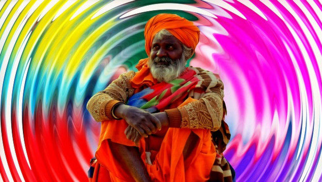 a sadhu sitting radiating energy all around him