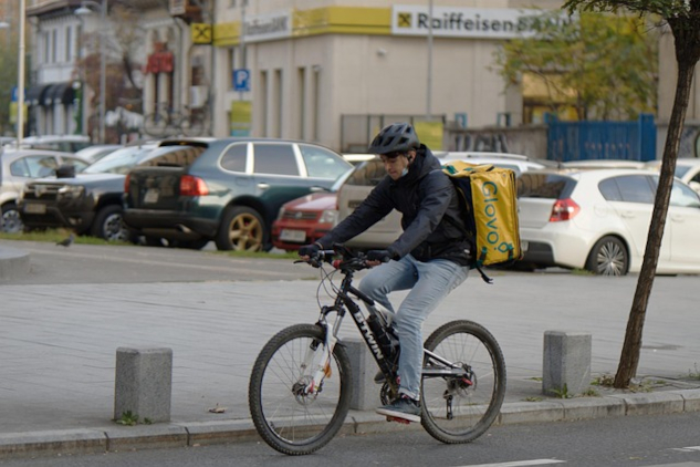 a man riding a bicycle. 