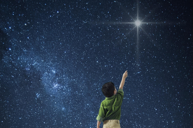 InnerSelf Magazine: March 17, 2025. Young boy reaching for the North Star. Image by Lothar Dieterich from Pixabay.