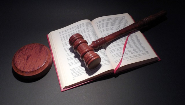 Choosing to Dismiss Your Inner Judge An image of a judge's gavel on top of an open book. Image by succo from Pixabay.