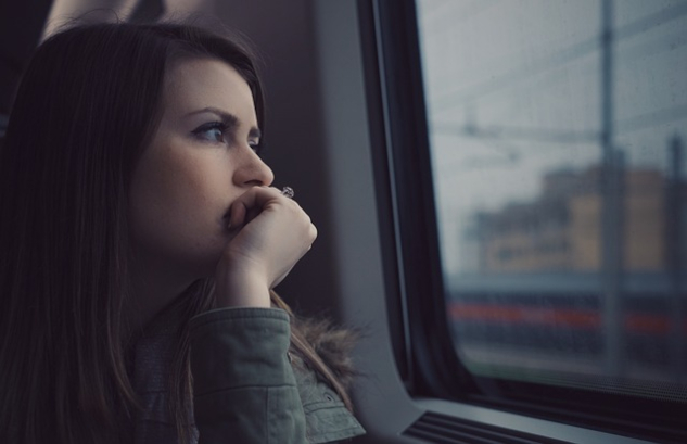 InnerSelf's Weekend Inspiration: March 21-22-23, 2025 Young woman sitting in a train staring out the window. Image by StockSnap from Pixabay.