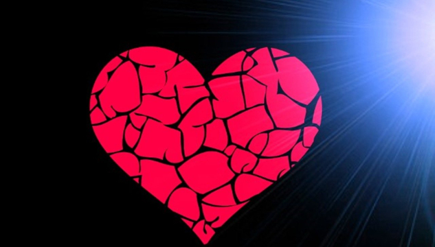Survivor’s Guilt: Living With the Loss of a Loved One. drawing of a "cracked" heart with a bright white light on the side. Image by Mariana Vartaci from Pixabay