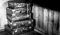 A stack of old suitcases. Image by Rudy and Peter Skitterians from Pixabay.