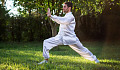 A man practicing Chi Kung in an outside setting. Image by franciscojcesar from Pixabay.&nbsp;